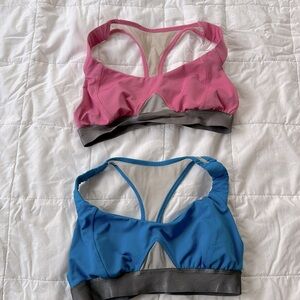 Two Hylete sports bras